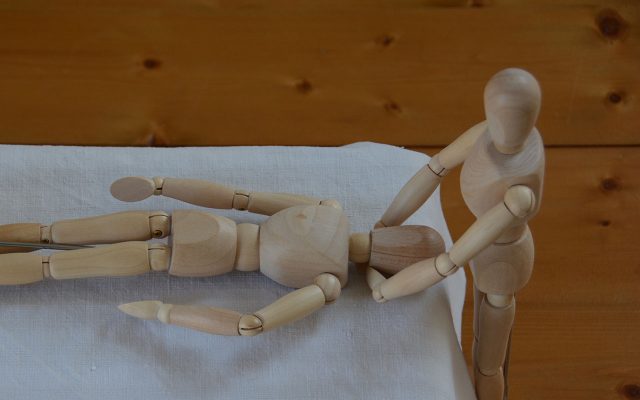 Behandlung am Kopf